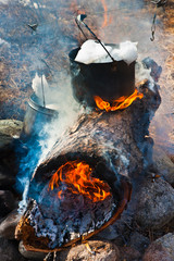 Preparation of meal on a fire