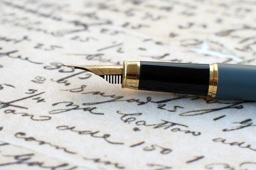 Fountain pen and old letter