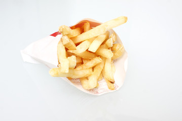 Fast food french fries on white background