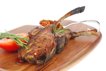 meat over wood: grlled ribs on plate