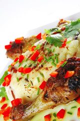 chicken legs served with vegetables