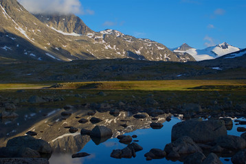 Fototapeta na wymiar Mountain scenery with reflection in Northern Norway
