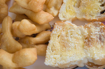 deep-fried dough stick and bread