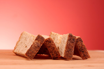Rusk on red background