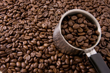 coffee beans and silver pot