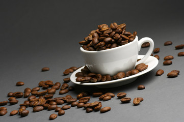 Coffee beans in cup