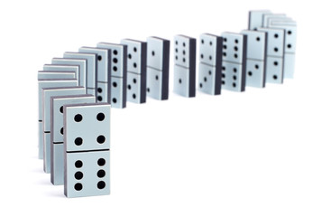Line of domino pieces on white background
