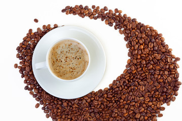 Coffee cup and grain on white background