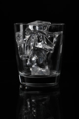 Glasses with ice on a black background
