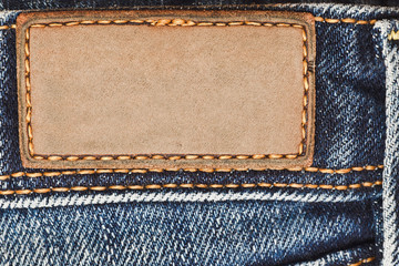 Blank leather label on jeans