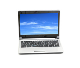 Fototapeta premium blue sky in laptop isolated on white
