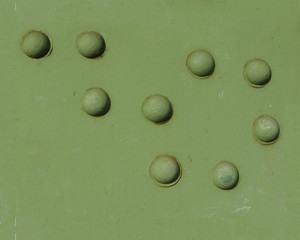 detail of green fortified industrial metal