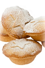 Mince Pies with dusting of icing susgar on white background