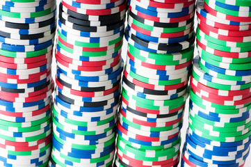 Stack of various casino chips - gambling concept