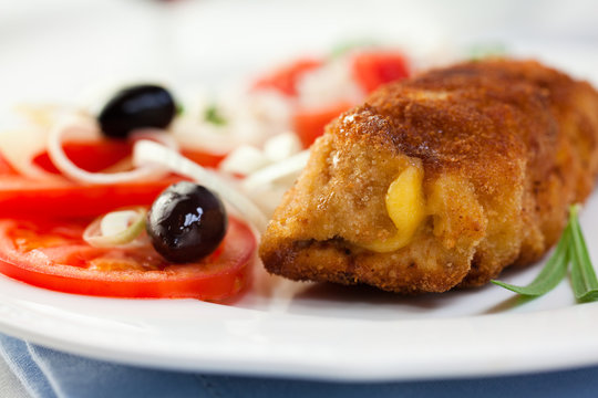 Breaded chicken roulade with cheese