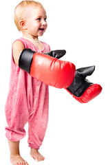 Beautiful baby in boxing gloves punching