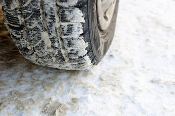 Winter - snow car tire on snow and ice