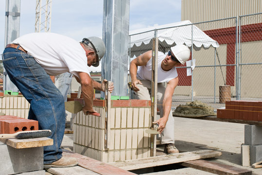 Bricklayers Using Levels