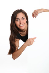 Woman in black dress showing message on white board