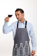 Sommelier tasting red wine