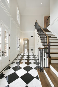 Foyer with checkerboard floor