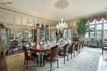 Formal dining room with wall mirrors