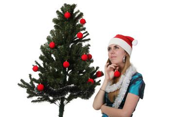 Woman decorate a christmas tree