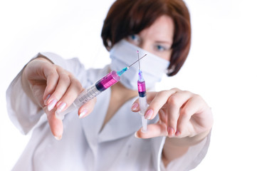 Doctor with syringes