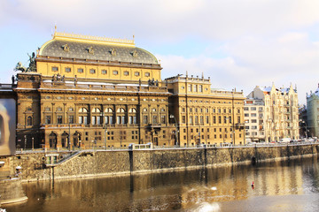 Fototapeta na wymiar First Snow in Prague, national Theatre in the sunny Day