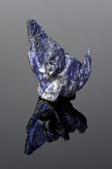 Recently cooled lava rock with iridescent colors.