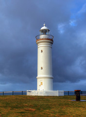 lighthouse against dramatic sky