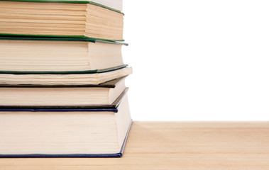 pile of old books isolated on white