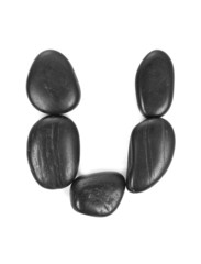 Letter 'U' made of stones isolated on white