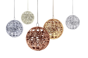 Gold copper silver Christmas balls hanging on white
