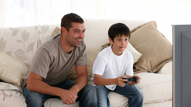 Father and his son playing together