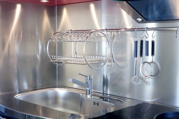 Kitchen silver sink and vitroceramic stove hob