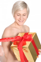 Young girl with christmas gift in studio