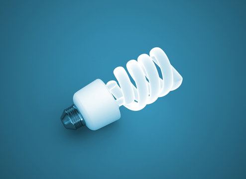 energy saving light bulb on blue background