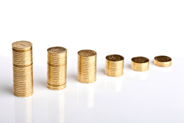 columns of coins on white