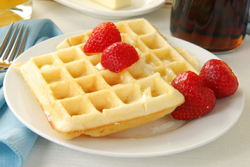 Buttered waffle with strawberries