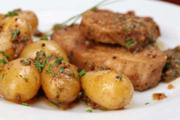 Baby potatoes with roast pork