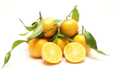 Fresh mandarines with green leaves