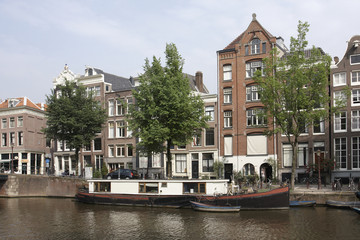 Canal scene with houseboat, Amsterdam