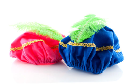 Wederzijds zingen Normalisatie pink and blue hat with green feather of Zwarte Piet Stock Photo | Adobe  Stock