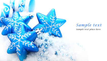 blue christmas decoration baubles on white