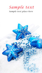 blue christmas decoration baubles on white