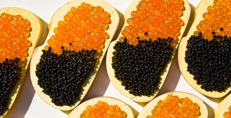 Sandwiches with red and black caviar