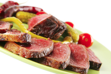 meat and vegetables with peppers