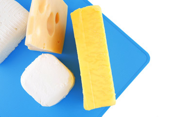 cheeses on blue plate