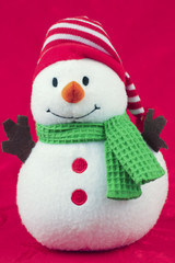 Toy Snowman on Red